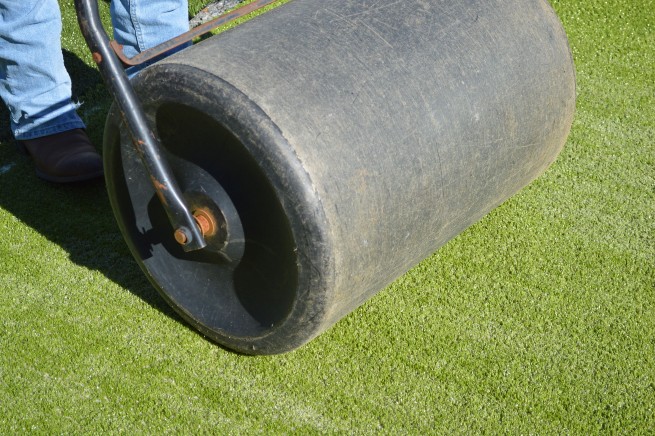 Fresno artificial grass installation - top layer rolled